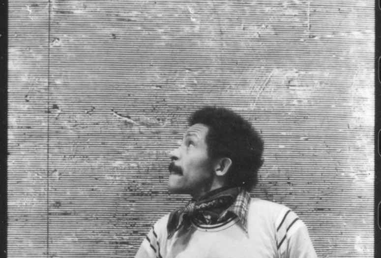Jack Whitten in his studio at 40 Crosby Street, New York, with the painting Rho I or Rho II (both 1977), c. 1977. Photo: Paul G. Viani
