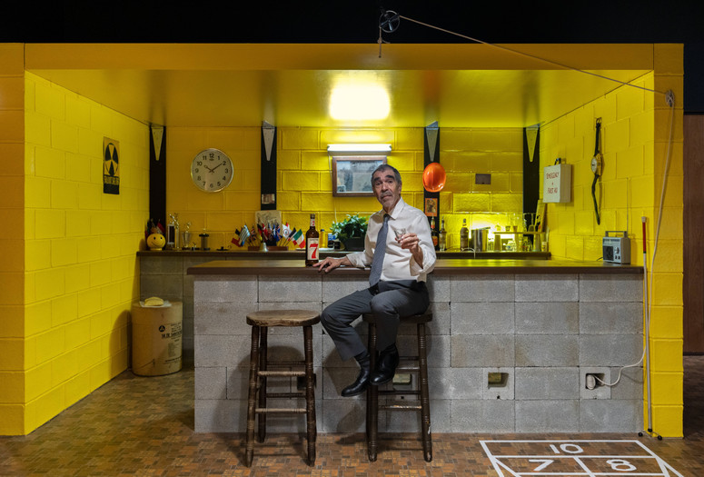 Michael Smith. Government Approved Home Fallout Shelter Snack Bar. 1983/2023. Props, furniture, linoleum, Vacuform, cinder blocks, wood paneling, sound recording, video game with purpose-built cabinet, television, standard-definition video (color, sound; 24:10 min.), seven pencil drawings on paper, and ephemera. The Museum of Modern Art, New York. Gift of Jill and Peter Kraus, 2021. © 2025 Michael Smith. Digital image © 2025 The Museum of Modern Art, New York. Photo: Jonathan Dorado