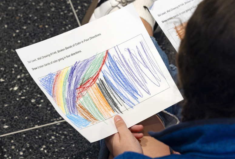 An activity sheet with colorful bands drawn by a gallery talk participant. Photo: On White Wall Inc.