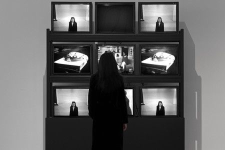 Installation view of the exhibition Signals: How Video Transformed the World, The Museum of Modern Art, New York, March 5–July 8, 2023. Photo: Robert Gerhardt. Digital image © 2026 The Museum of Modern Art, New York. Shown: Frank Gillette, Ira Schneider. Wipe Cycle. 1969/2017. Two standard-definition videos (black and white, silent; 30 min.); sound; live television broadcast; surveillance camera; nine cathode-ray tube monitors; custom-made video switcher, micro-controllers, and software; shelving, 94 1/2 × 82 11/16 × 29 9/16" (240 × 210 × 75 cm). The Museum of Modern Art, New York. Acquired through the generosity of Maja Oeri. © 2026 Frank Gillette and Ira Schneider Artworks Company LLC