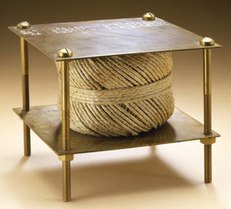 Marcel Duchamp. With Hidden Noise. 1916. Ball of twine between two brass plates, joined by four long screws, containing unknown object added by Walter Arensberg, 5 × 5 × 5 1/8" (12.7 × 12.7 × 13 cm). Philadelphia Museum of Art: The Louise and Walter Arensberg Collection, 1950