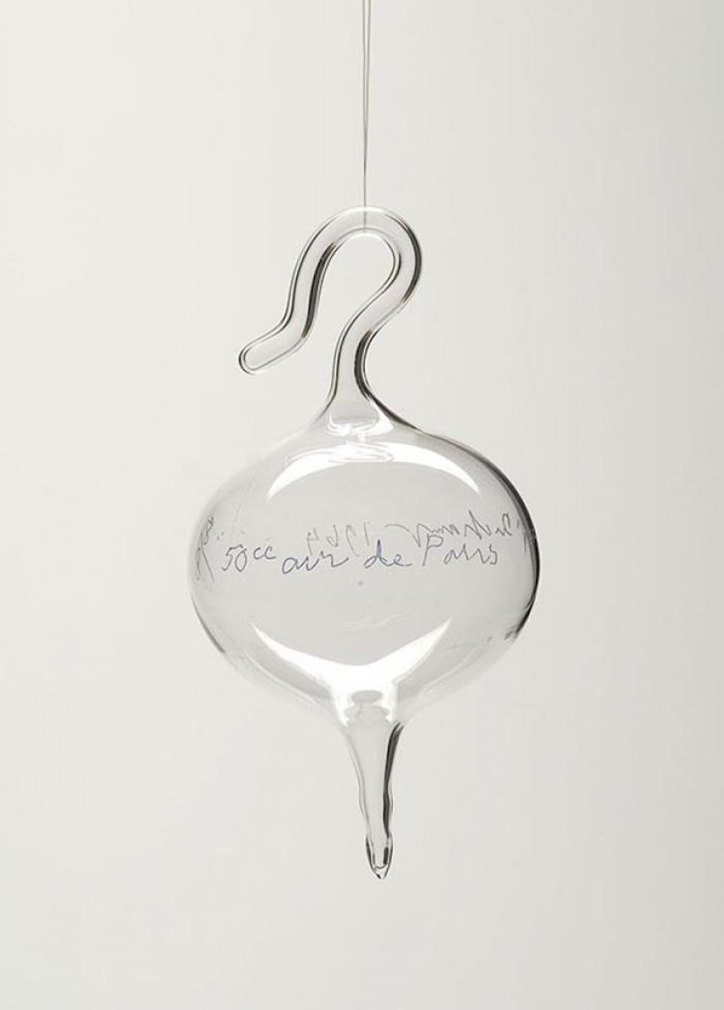 Marcel Duchamp. *Air de Paris (50 cc of Paris Air)*. 1964 edition (after 1919 original). Glass ampule, 12 5/16 × 7 5/16 × 6" (31.3 × 18.6 × 15.2 cm). Partial gift of Mrs. William H. Conroy, Eskenazi Museum of Art, Indiana University