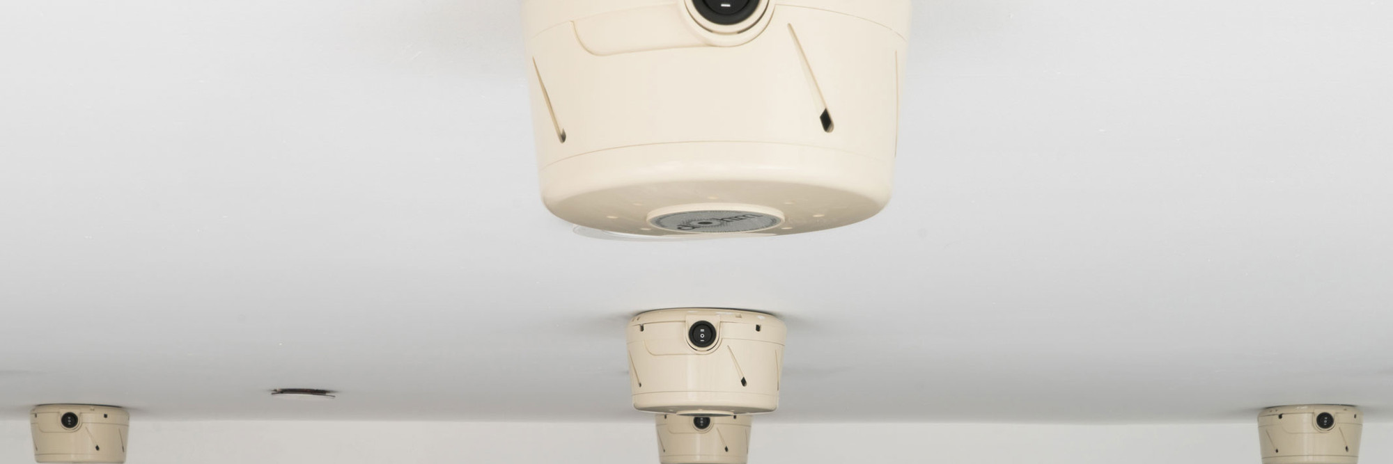 Carolyn Lazard. A Conspiracy. 2017. Dohm white noise machines, dimensions variable. The Museum of Modern Art, New York. Fund for the Twenty-First Century. © 2026 Carolyn Lazard