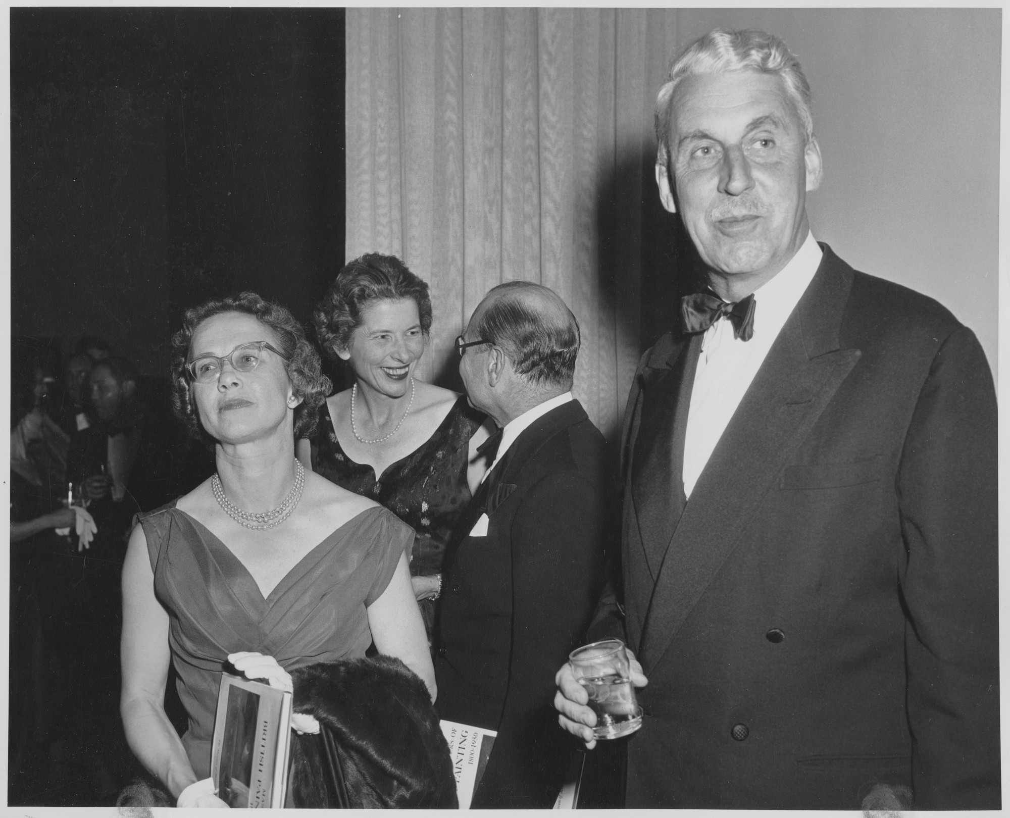 Left to right: Lady Rundall, Lady Makins, and two unidentified male ...