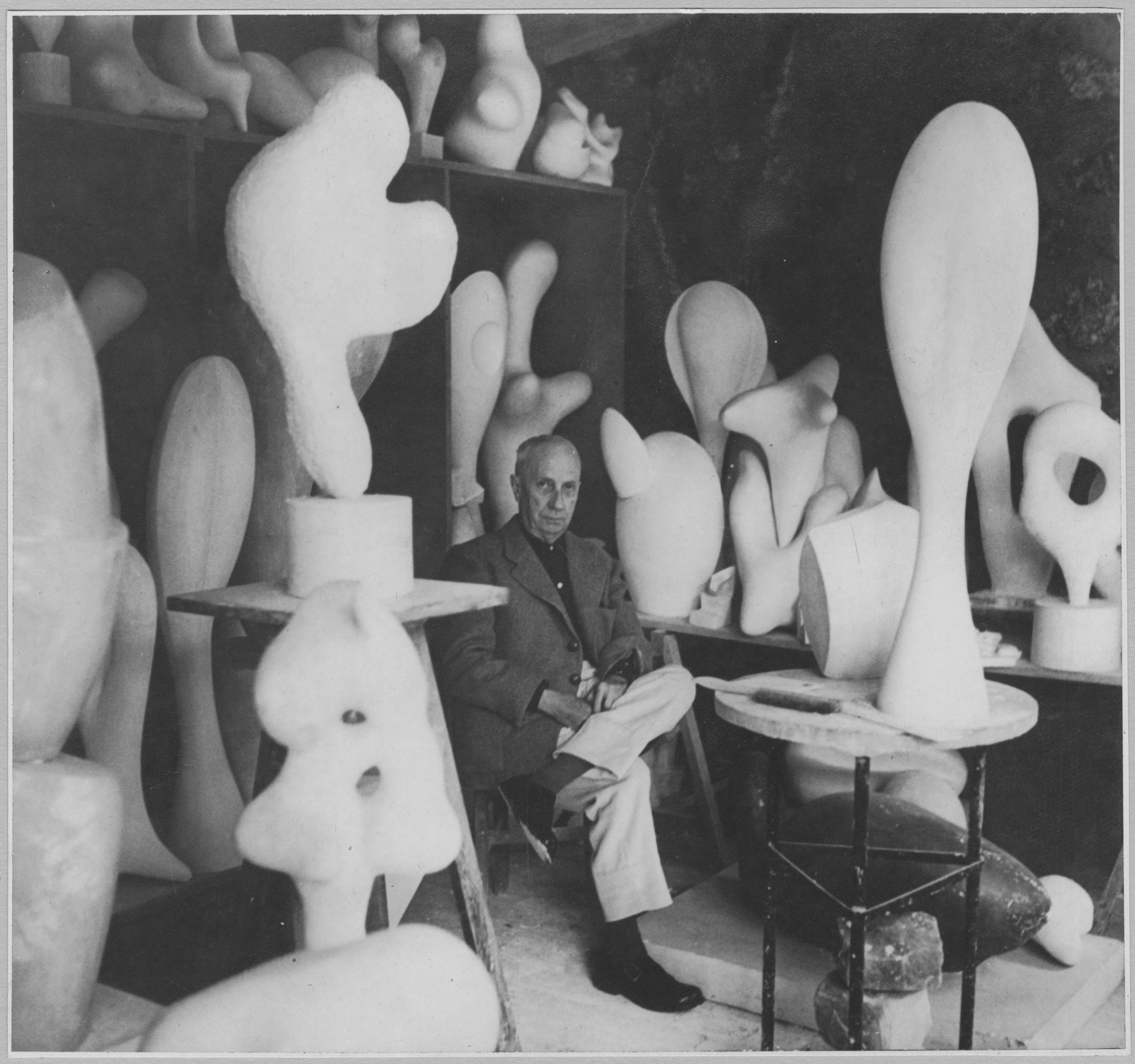Jean Arp in his studio at Meudon. 1958.