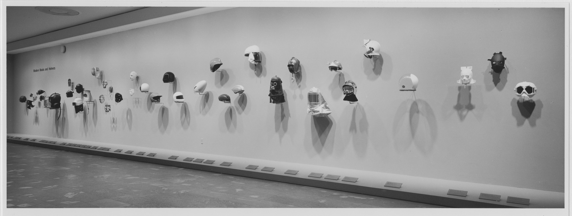 Installation view of the exhibition "Modern Masks and Helmets" MoMA