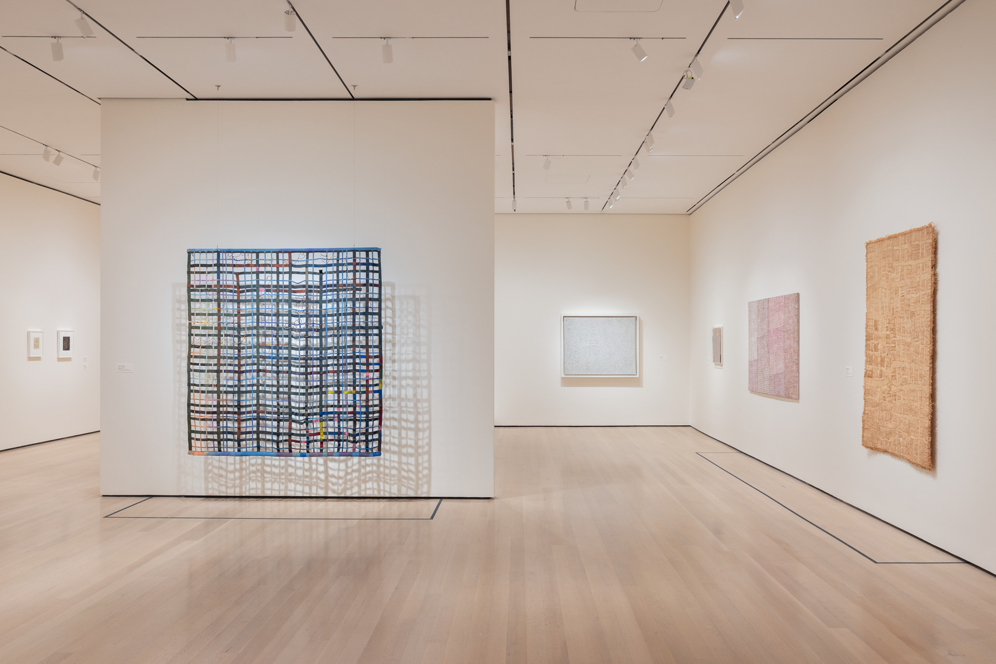 Installation view of the exhibition “Woven Histories: Textiles and