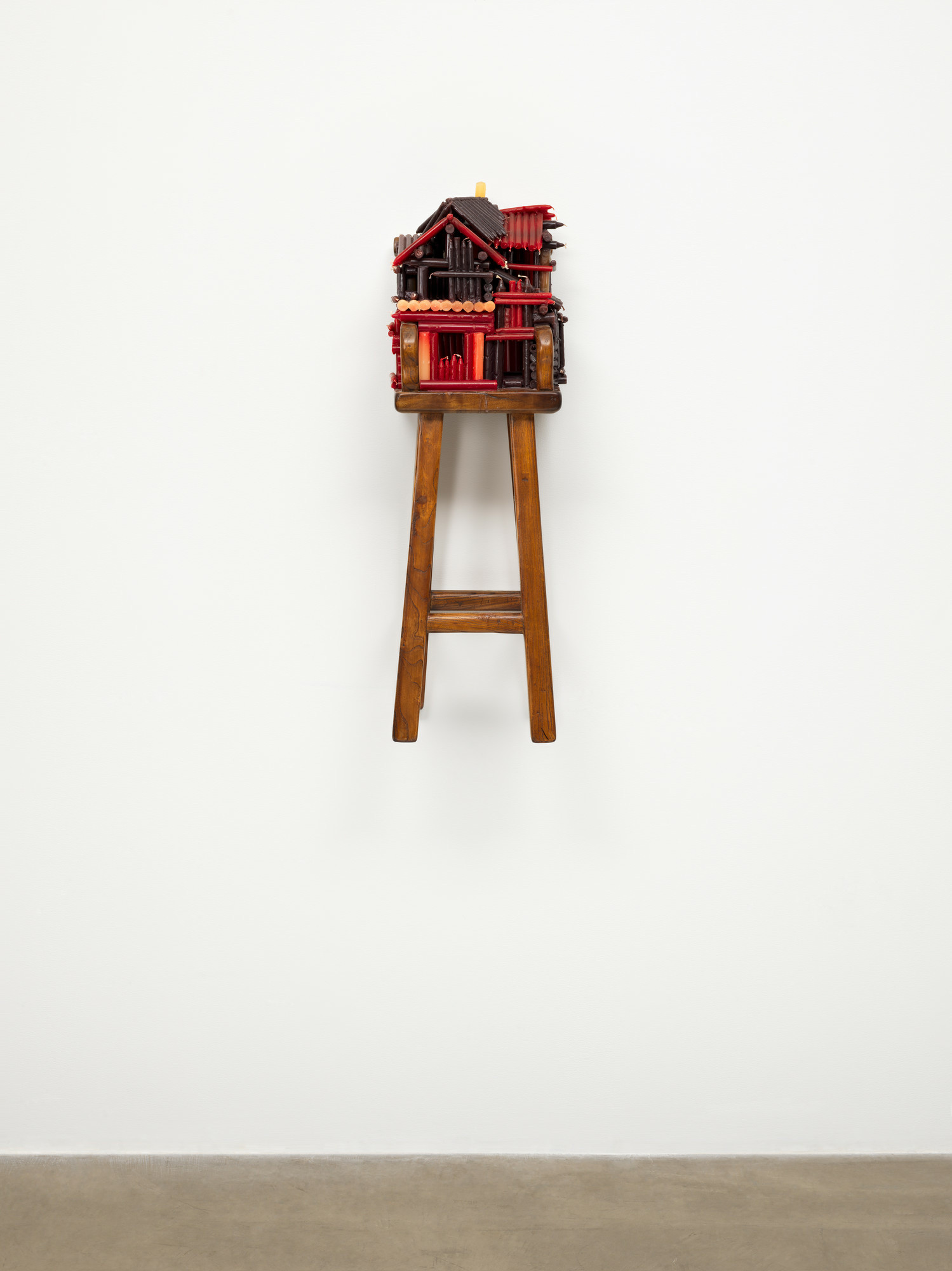 Chen Zhen. Un Village sans frontières. 2000. Wood chair and candles. Gift of Marlene Hess and James D. Zirin. © 2021 Chen Zhen/ Artists Rights Society (ARS), New York
