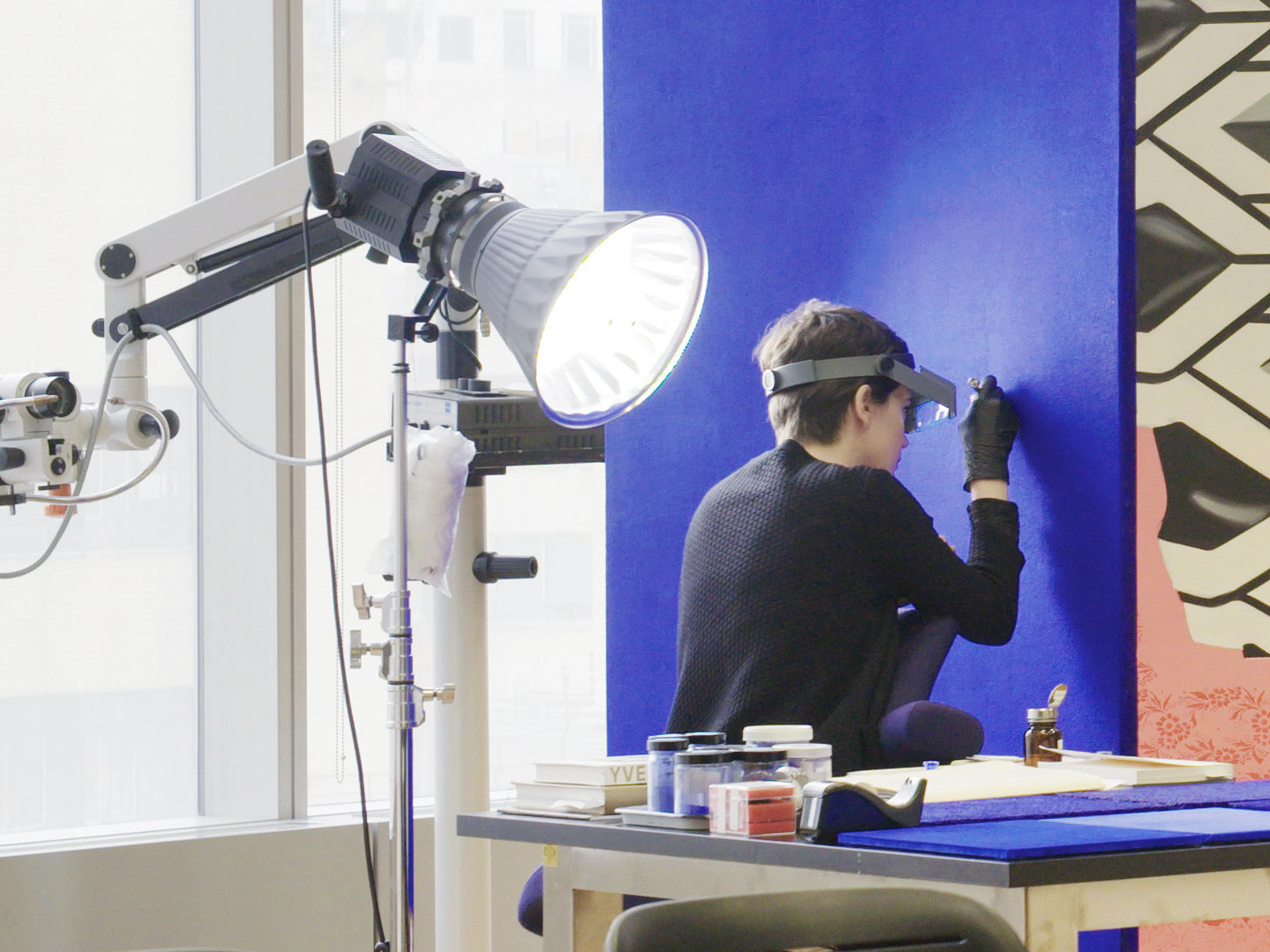 Conservation fellow Ellen Moody working on Yves Klein’s Blue Monochrome (1961). Still from MoMA’s YouTube series At the Museum. Artwork © 2018 Artists Rights Society (ARS), New York/ADAGP, Paris