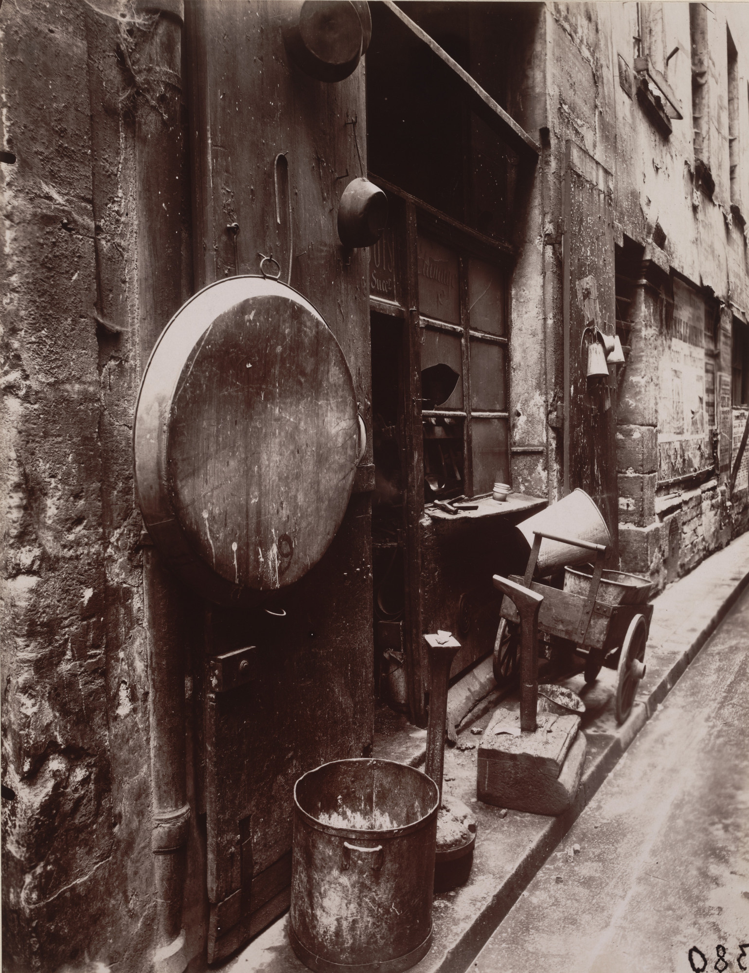 Eugène Atget. Rue de La Reynie, étameur. 1912 | MoMA