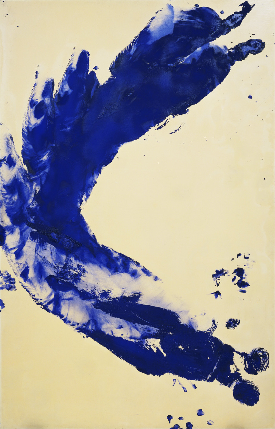 A cream-colored canvas features large, sweeping strokes of vibrant blue paint forming a crescent shape towards the right. Smaller blue smudges and dots are scattered around the main strokes. This is an AI generated description. To give feedback, email ai@moma.org.