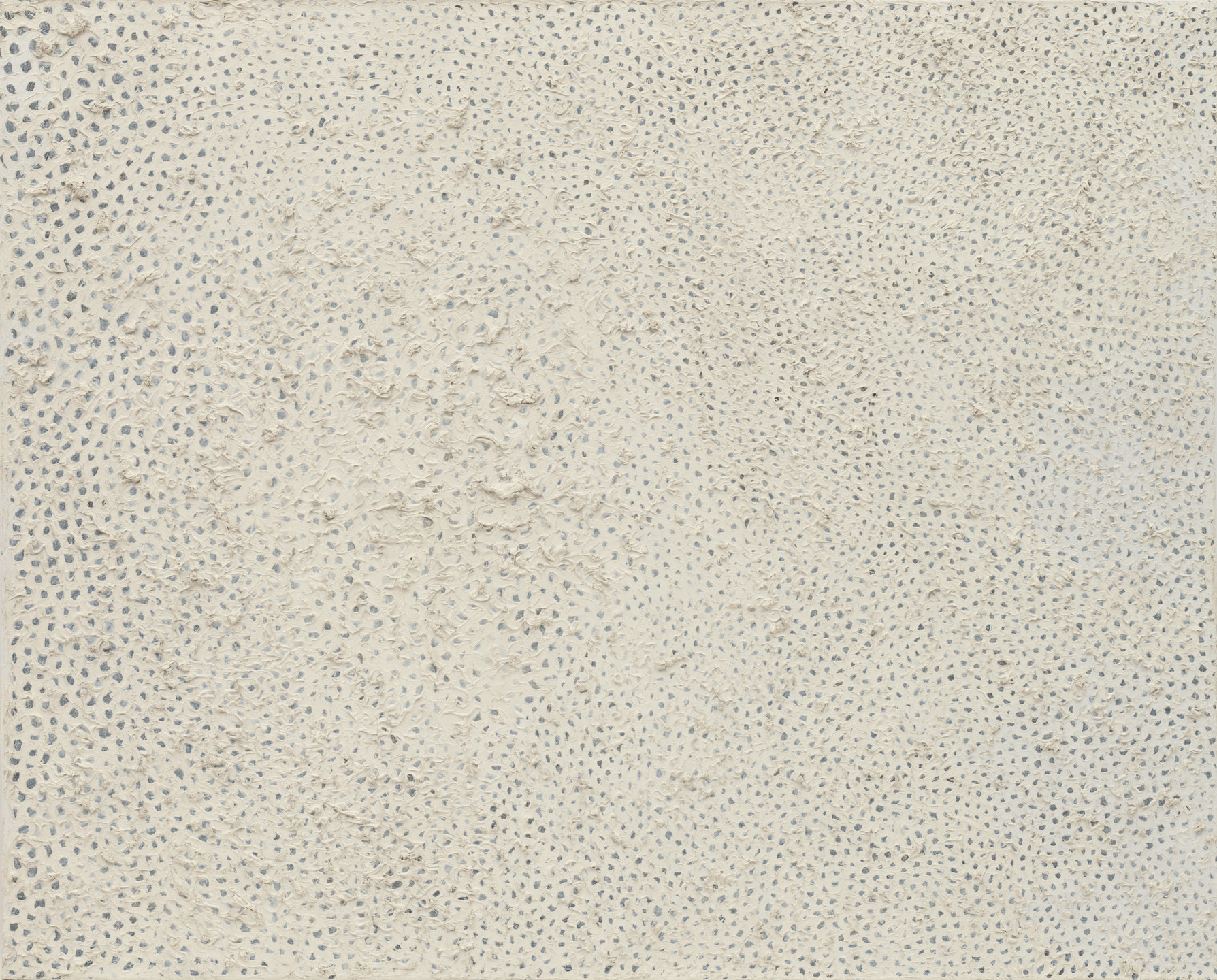 The image features a textured surface predominantly in shades of cream and light grey. Small, irregular dots are scattered across the entire canvas, creating an undulating, perforated pattern. This is an AI generated description. To give feedback, email ai@moma.org.