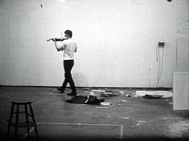 Playing a Note on the Violin While I Walk Around the Studio