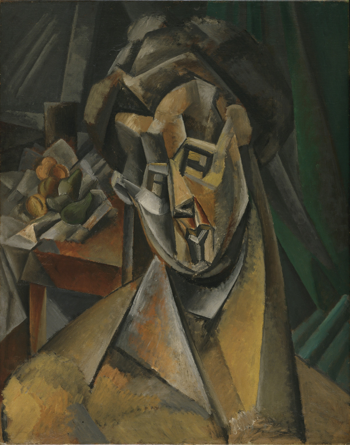 The image depicts a fragmented human face and upper torso composed of geometric shapes in shades of brown, gray, and yellow. In the background, there is a table with fruit and a green curtain. This is an AI generated description. To give feedback, email ai@moma.org.