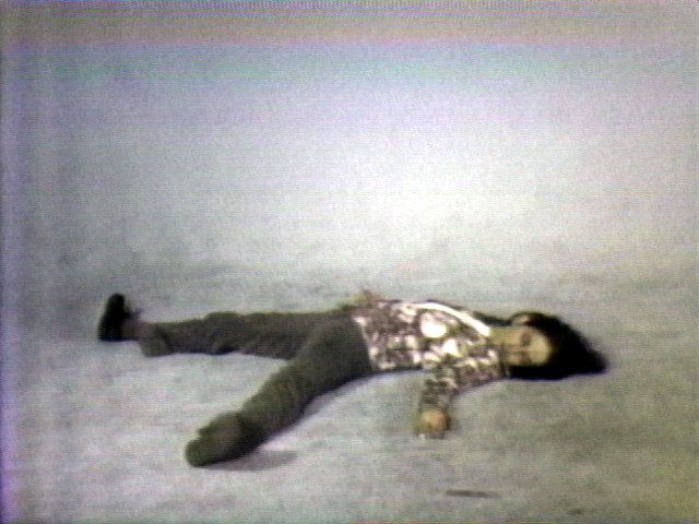 Elke Allowing the Floor to Rise Up Over Her, Face Up