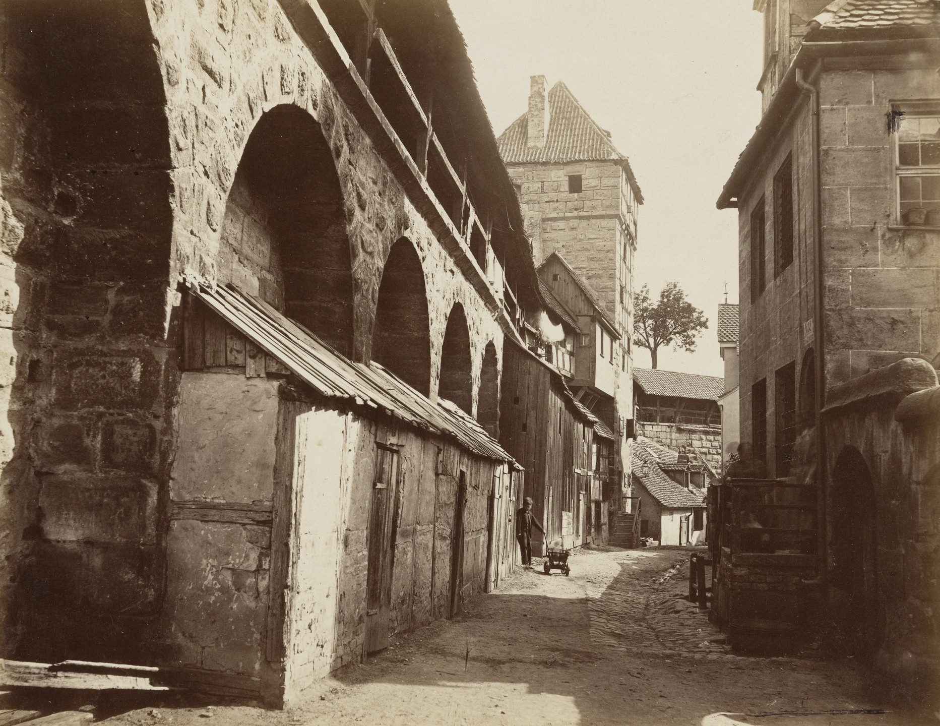 Johann Hahn. Hinter der Mauer. 1871