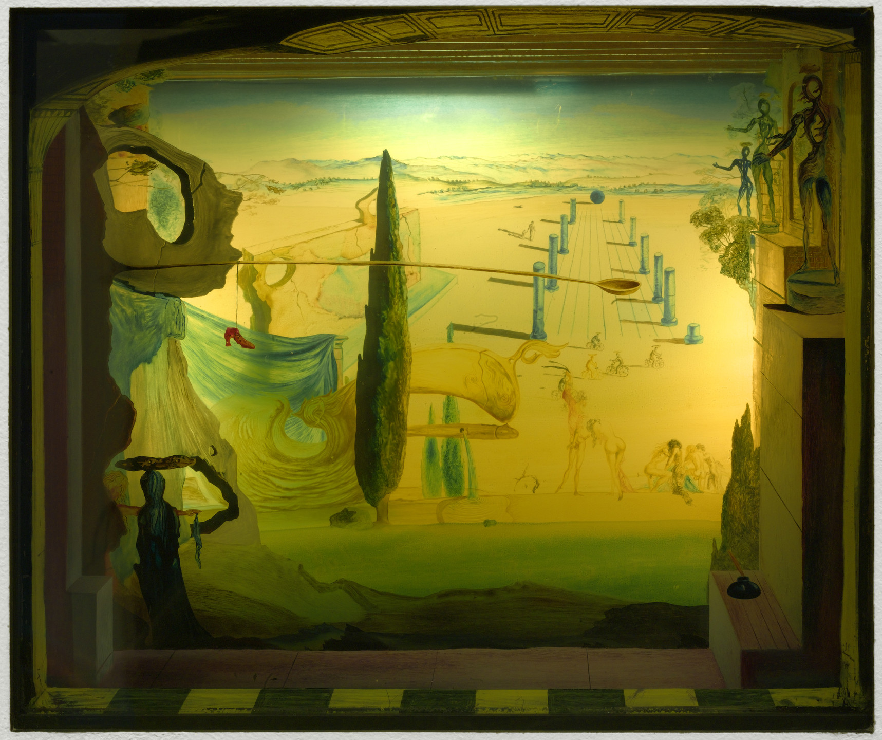 The image features a landscape with a yellow sky, distant mountains, and a path lined with blue columns. In the foreground, a green tree and draped cloth partially conceal a red shoe. This is an AI generated description. To give feedback, email ai@moma.org.