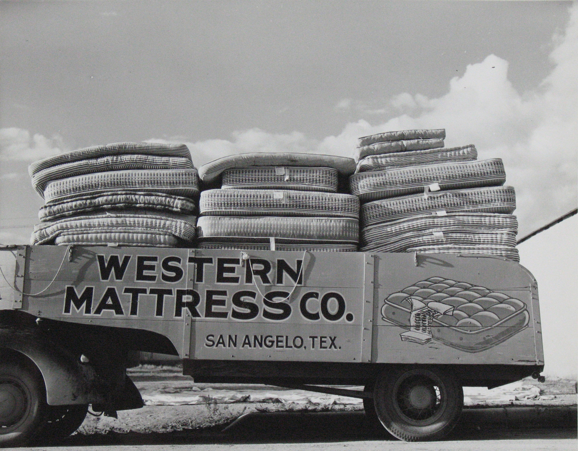 Russell Lee. Truck Filled with Mattresses. This Mattress Company Uses these Trucks to Distribute its Products Throughout Texas. San Angelo, Texas. 1939