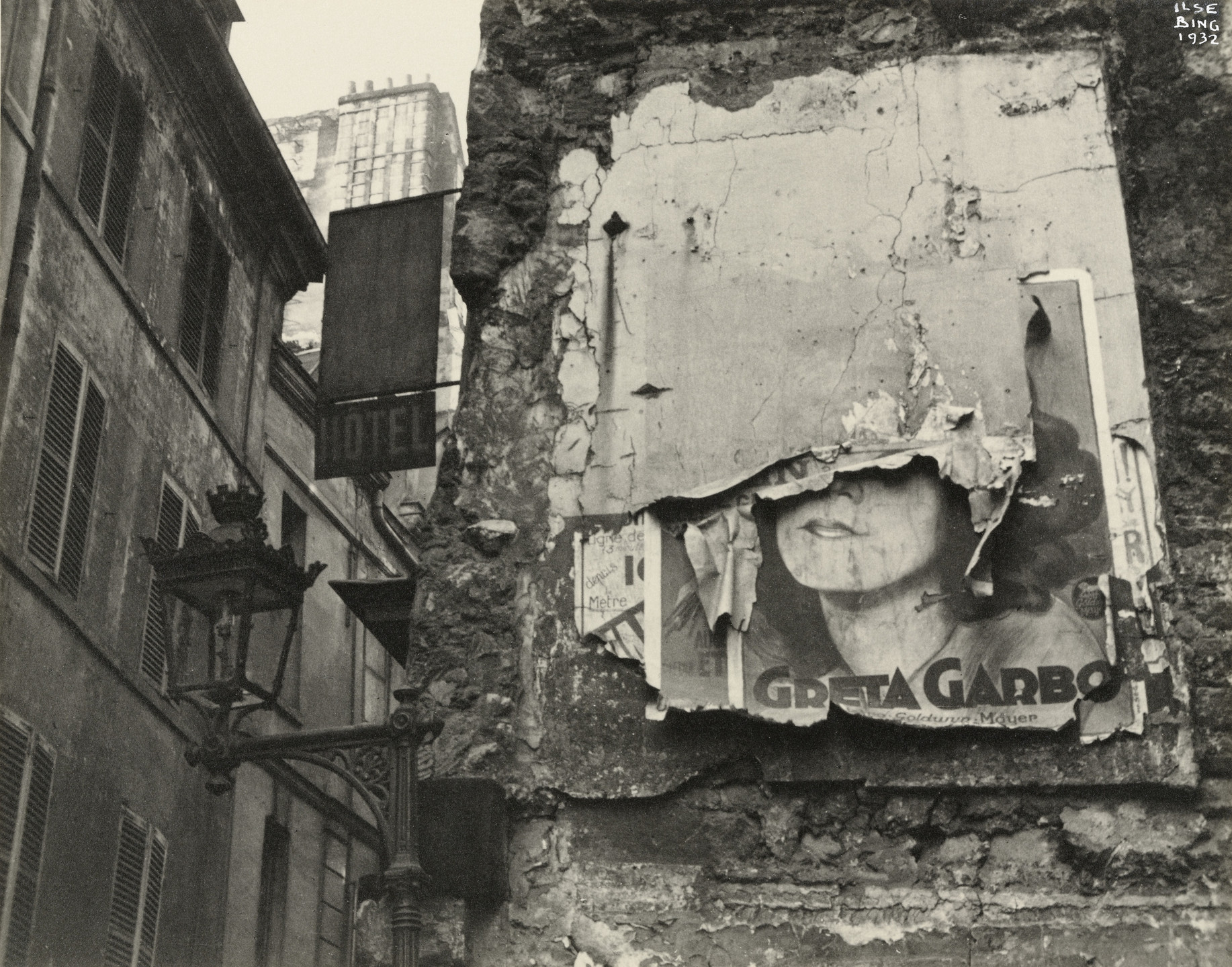 Ilse Bing. Greta Garbo Poster in Paris Ghetto. 1932