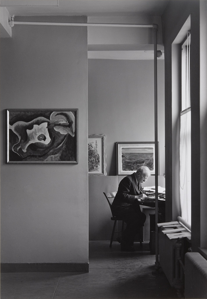 Alfred Stieglitz at his desk at An American Place
