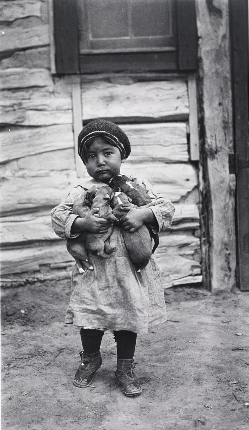 eugene-buechel-martha-may-fish-with-an-armful-of-pets-march-22-1931