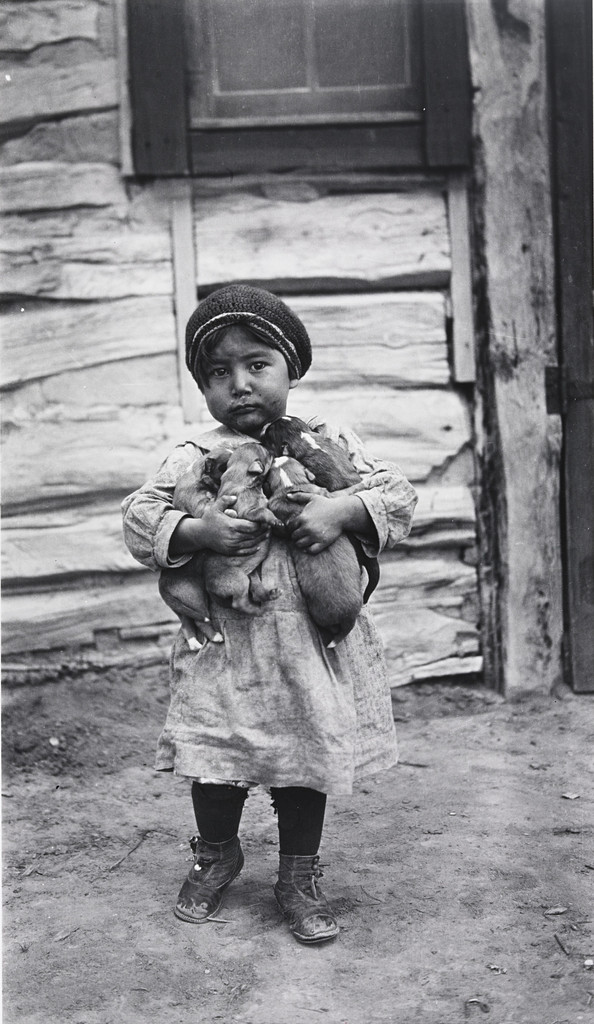 Martha May Fish with an Armful of Pets