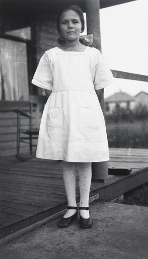 Nellie Whiting in Front of Porch