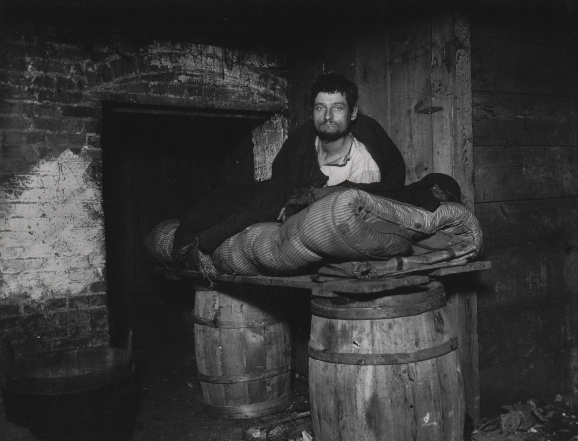 Jacob August Riis. The Man Slept in This Cellar for Four Years. 1890