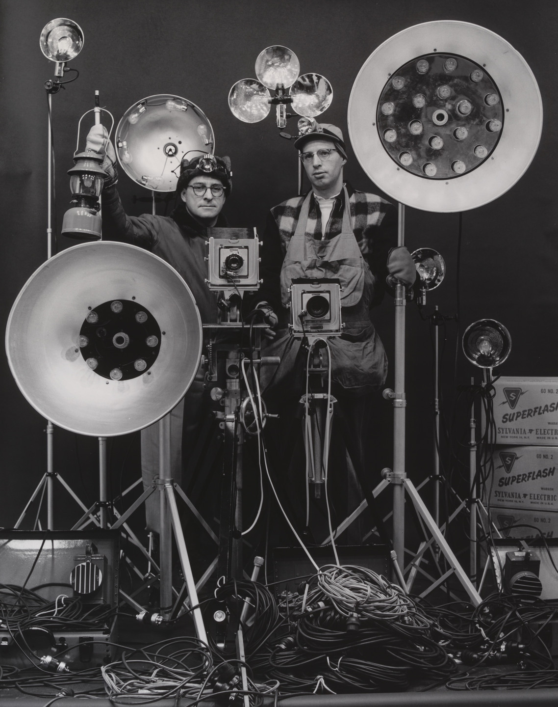O. Winston Link. O. Winston Link and George Thom with Part of Equipment Used in making Night Scenes with Synchronizer Flash. March 16, 1956