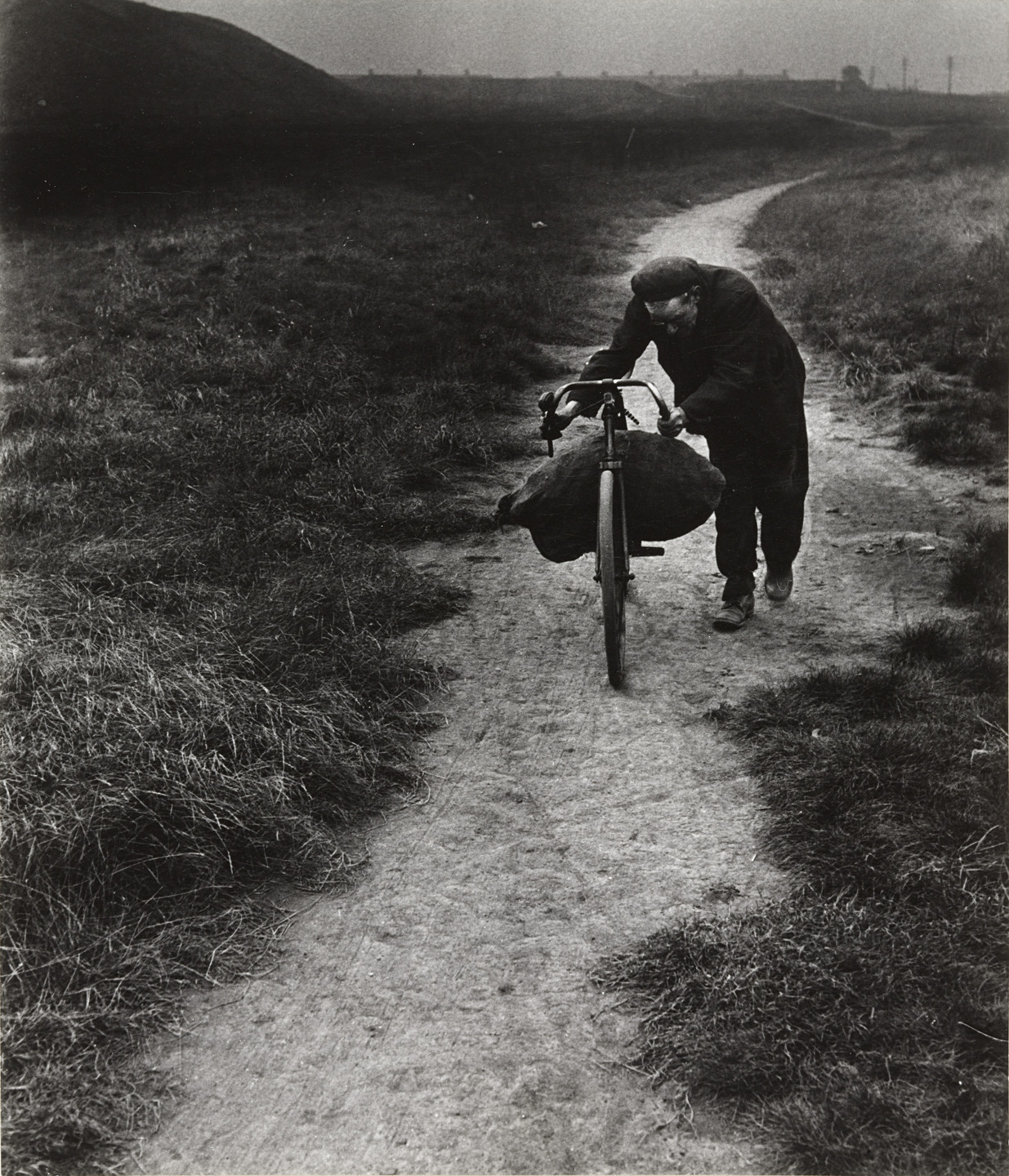 Bill Brandt. Coal-Searcher Going Home to Jarrow. 1937