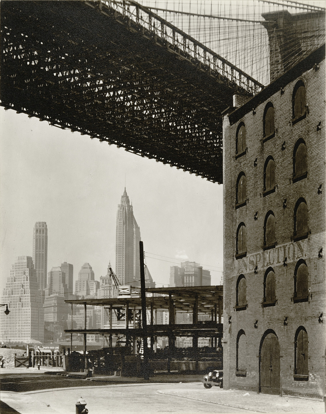 Berenice Abbott. Brooklyn Bridge, Water and New Dock Streets, Brooklyn. May 22, 1936