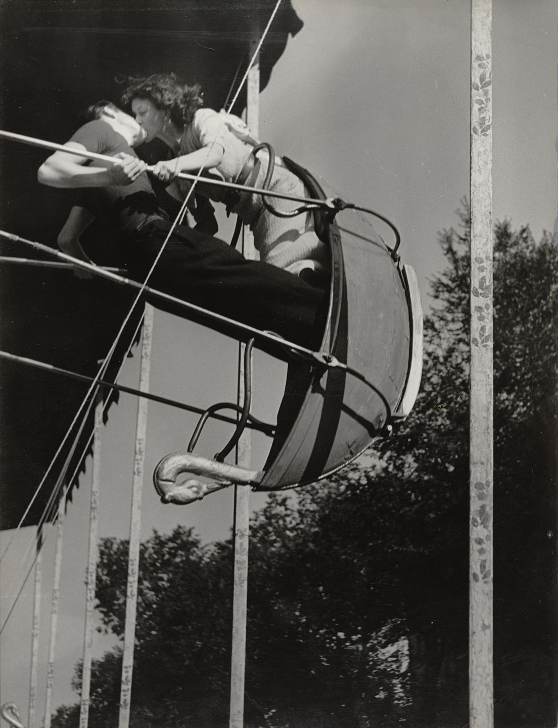 Brassaï (Gyula Halász). Kiss on a Swing at a Street Fair. c. 1936