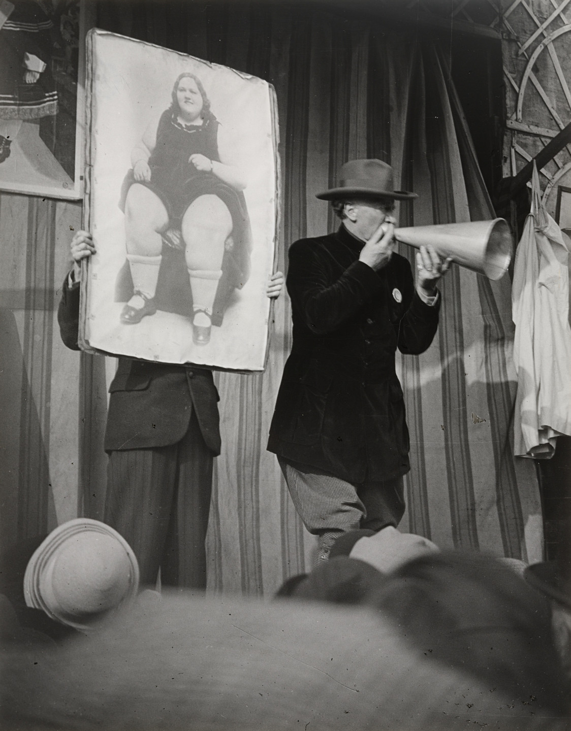 Brassaï (Gyula Halász). Street Fair, Presentation of a Freak. (La Fête foraine. La Présentation d&#39;un monstre). 1931