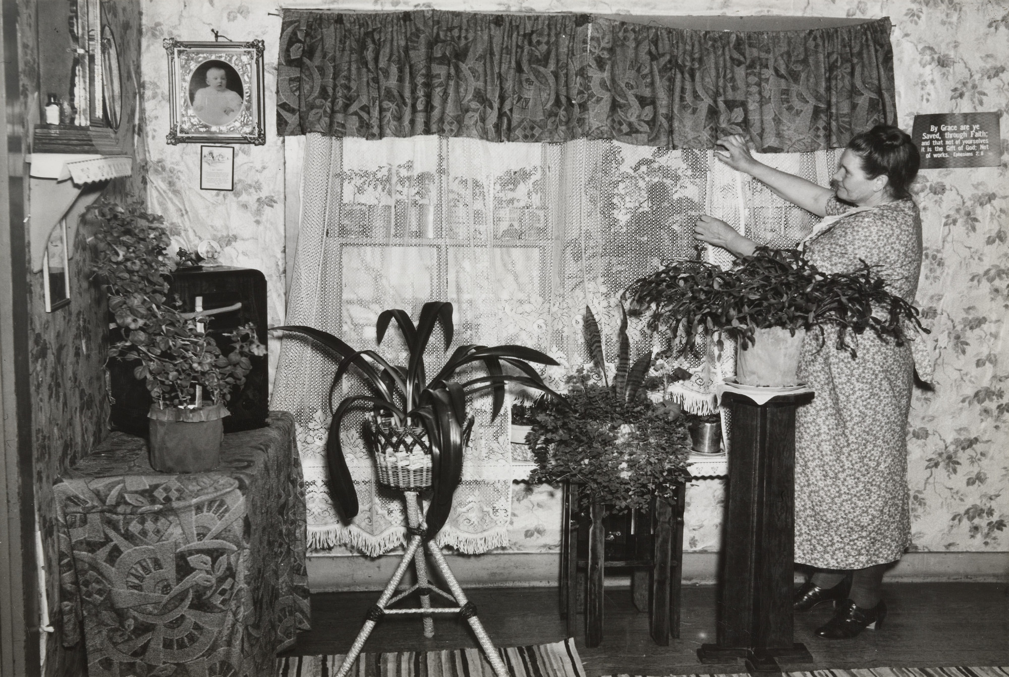Russell Lee. Mrs. Herman Perry in her Home at Mansfield, Michigan. She is the wife of an Oldtime Iron Miner who Worked in the Mines before they were Abandoned, Home in Mansfield, Michigan