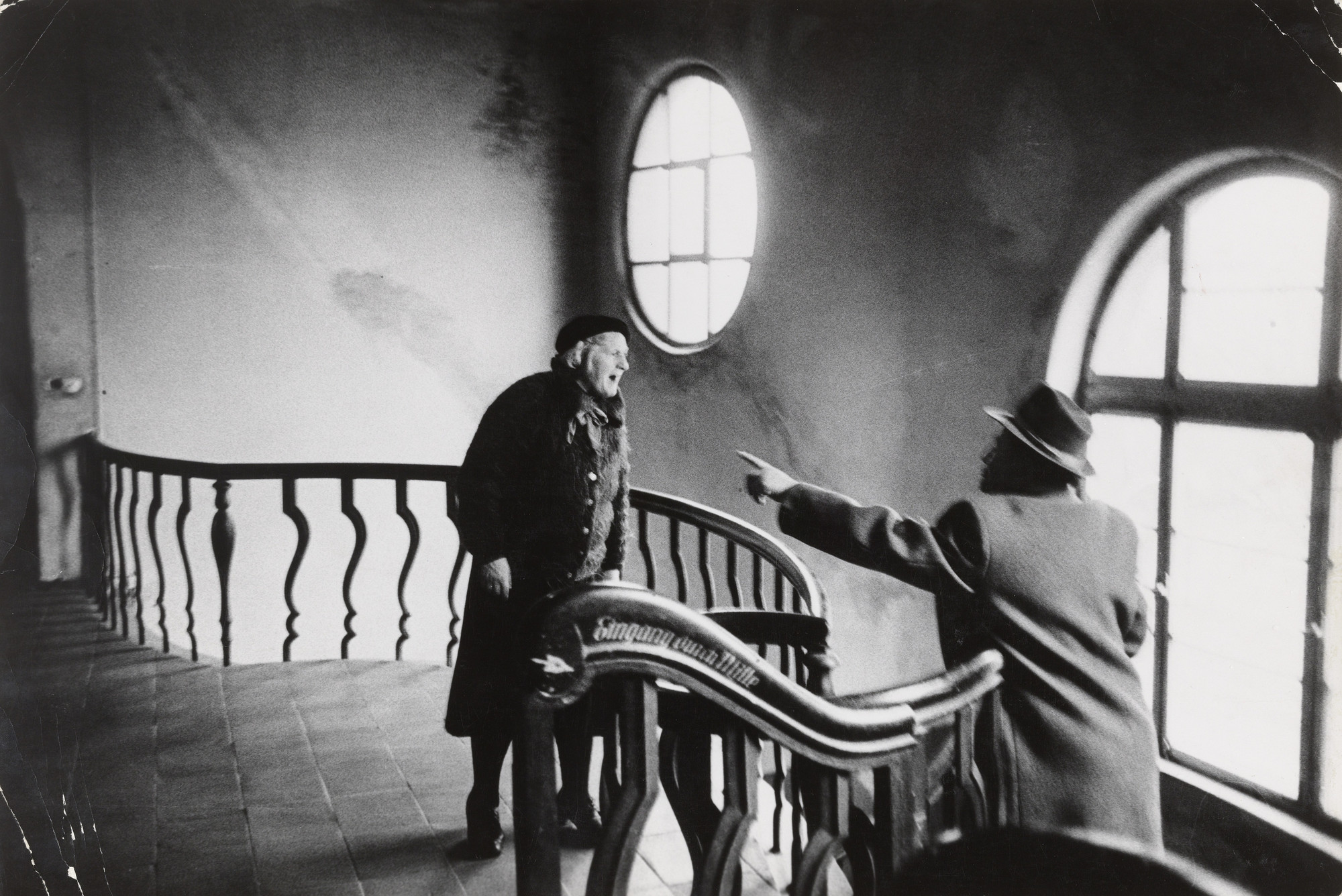 Leonard Freed. Frankfurt am Main, West Germany: Neighbors fight on the stairway of an apartment building. 1961