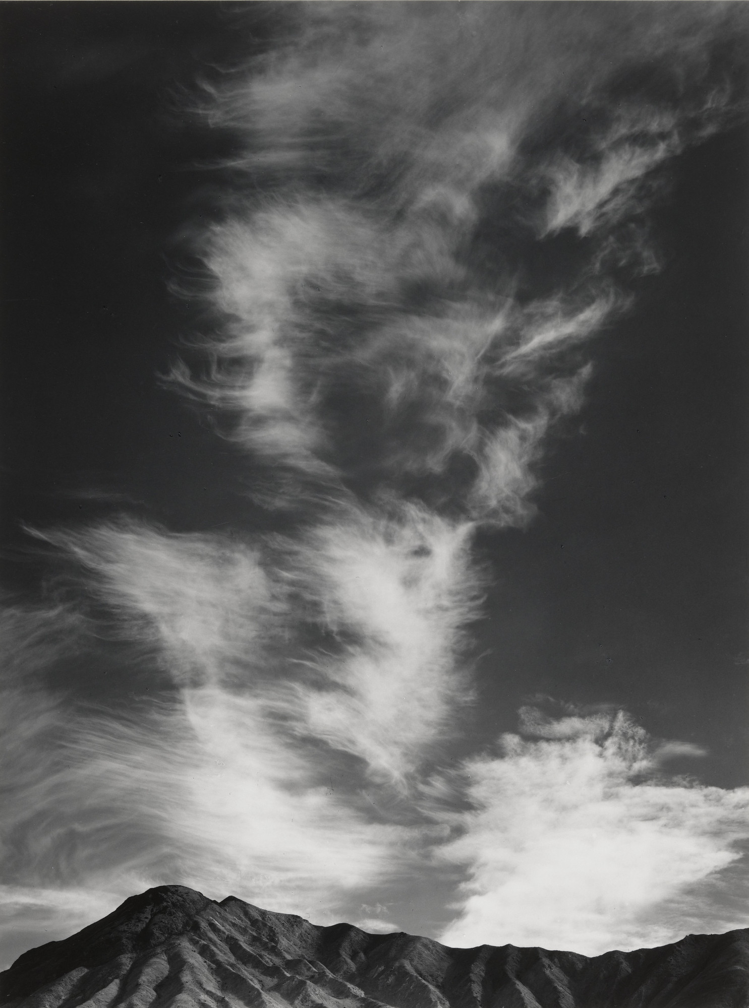 Ansel Adams. Clouds above Golden Canyon, Death Valley, California