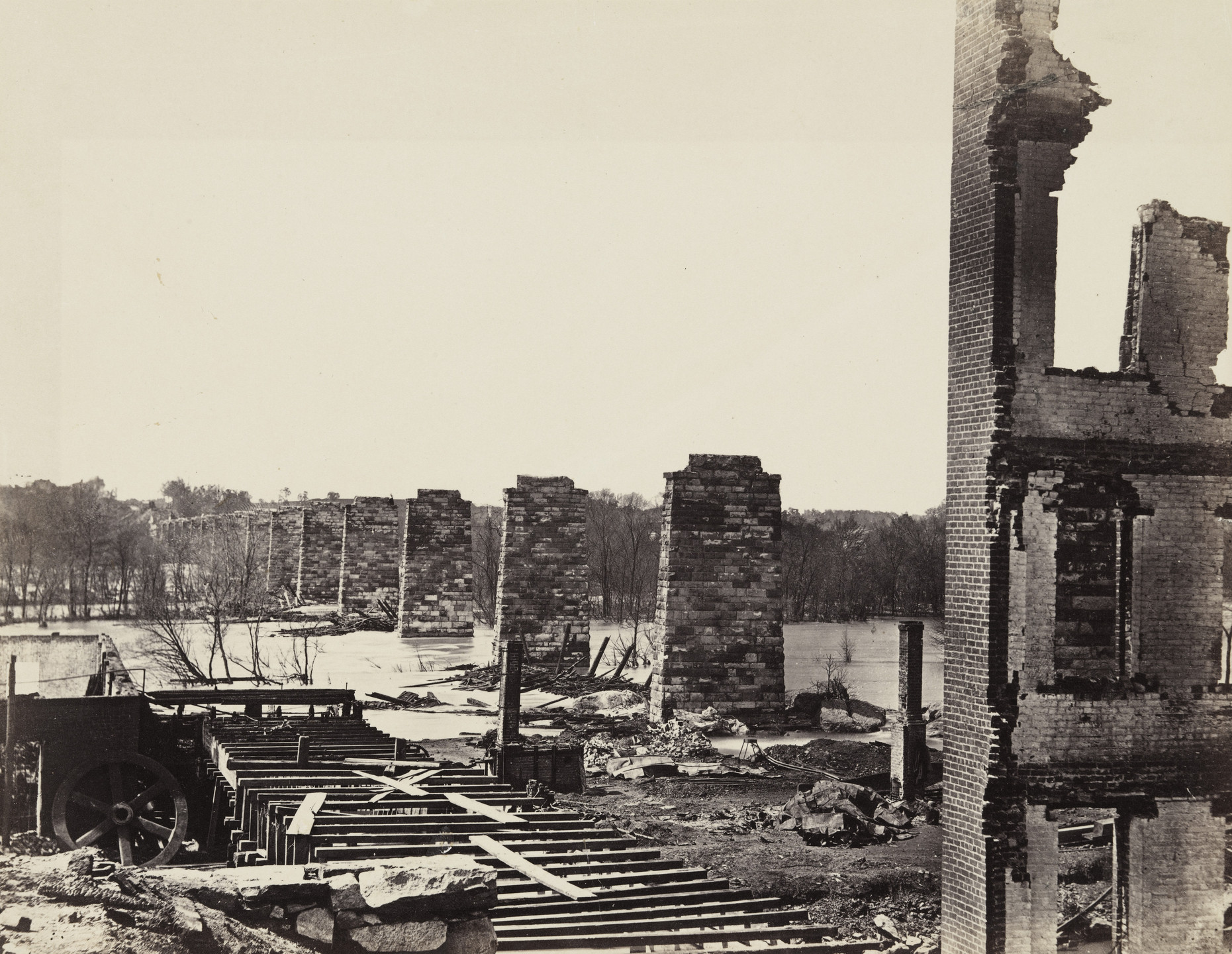 Alexander Gardner. Ruins of Petersburg and Richmond railroad Bridge (across the James). April, 1864