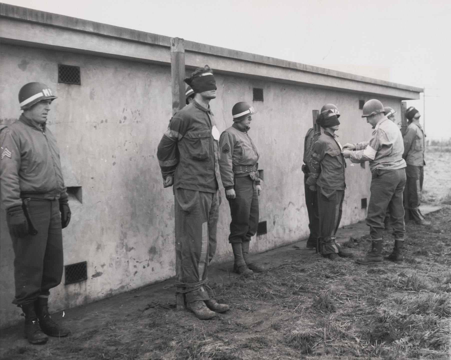 Peter Carroll/Associated Press. &#34;Placing Markers for Execution Squad&#34;. May 28, 1945