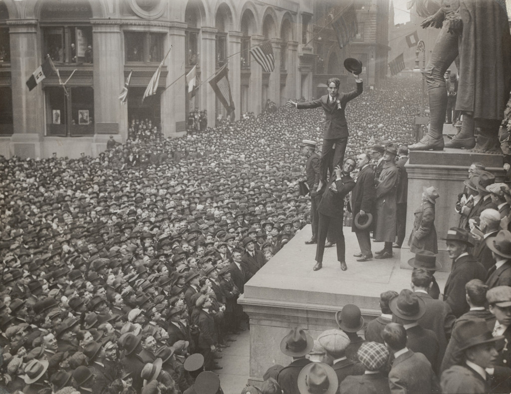 Douglas Fairbanks Boosting Charlie Chaplin to Boost the Liberty Loan in Front of the Sub-Treasury Building: All Wall Street Looking on with Approval