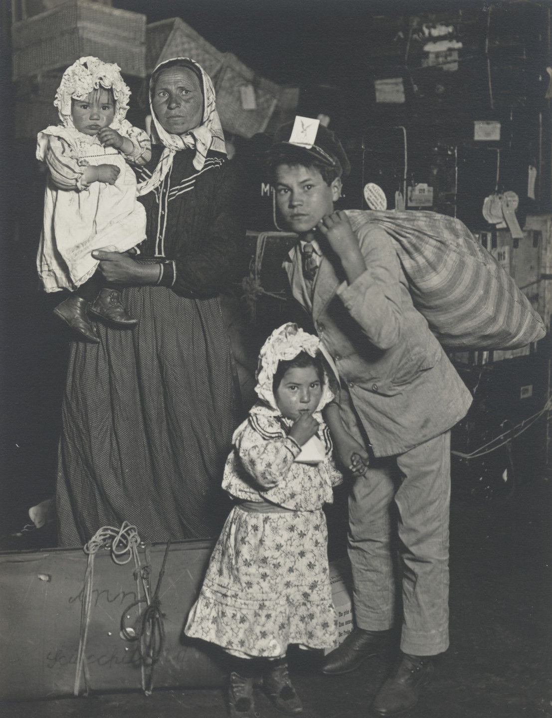 Lewis Wickes Hine. Italian Family Looking for Lost Baggage, Ellis Island, New York. 1905