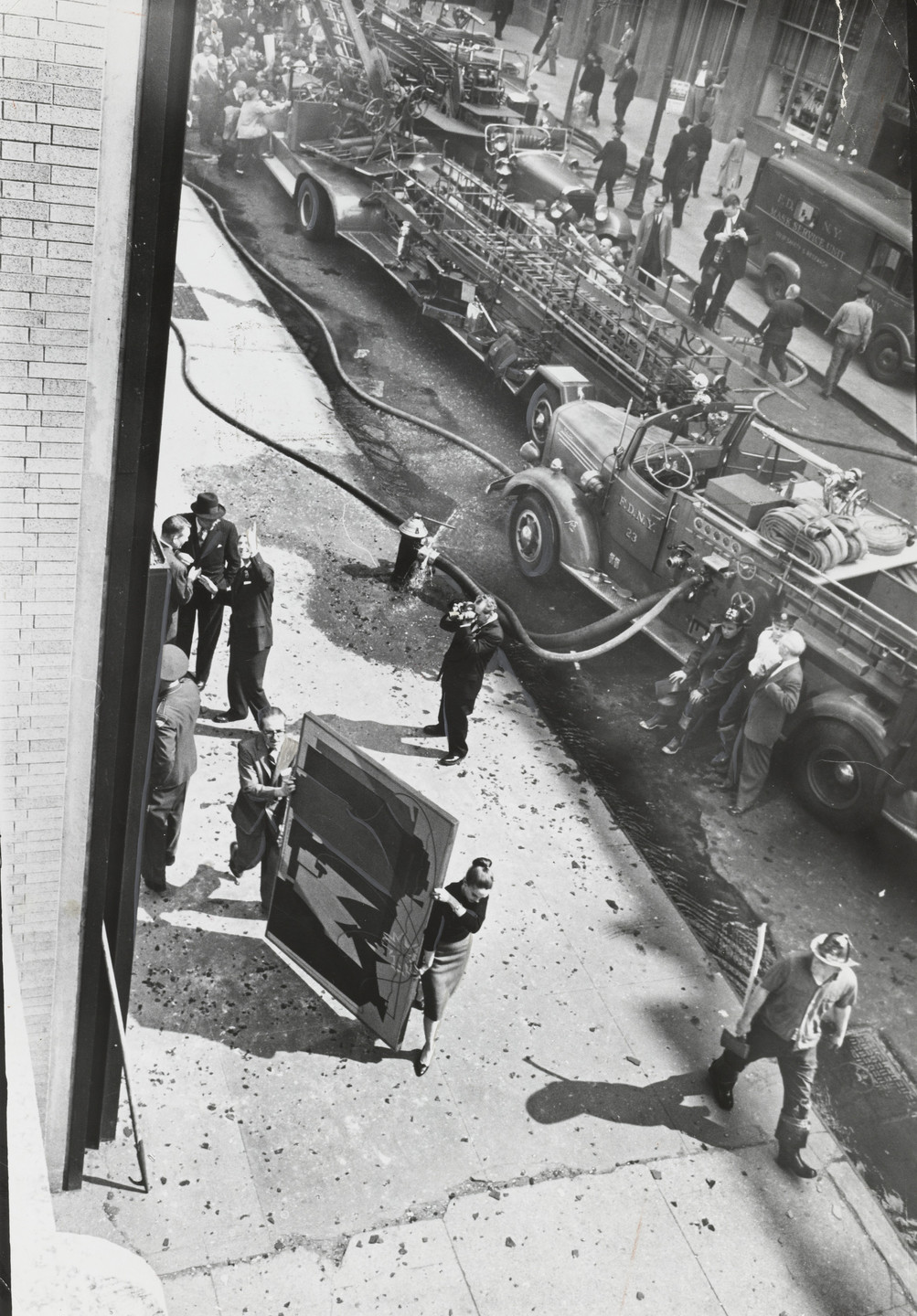 The New York Times. Most Art is Saved: Museum employees carry a painting out of The Museum of Modern Art. April 15, 1958