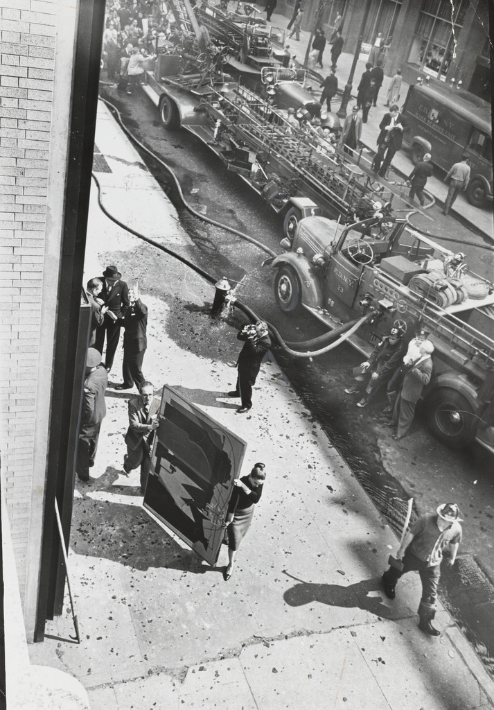 Most Art is Saved: Museum employees carry a painting out of The Museum of Modern Art