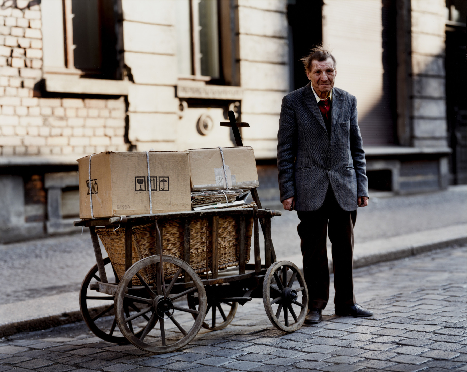 Eberhard Grames. Old Man with Cart, East Germany. 1990