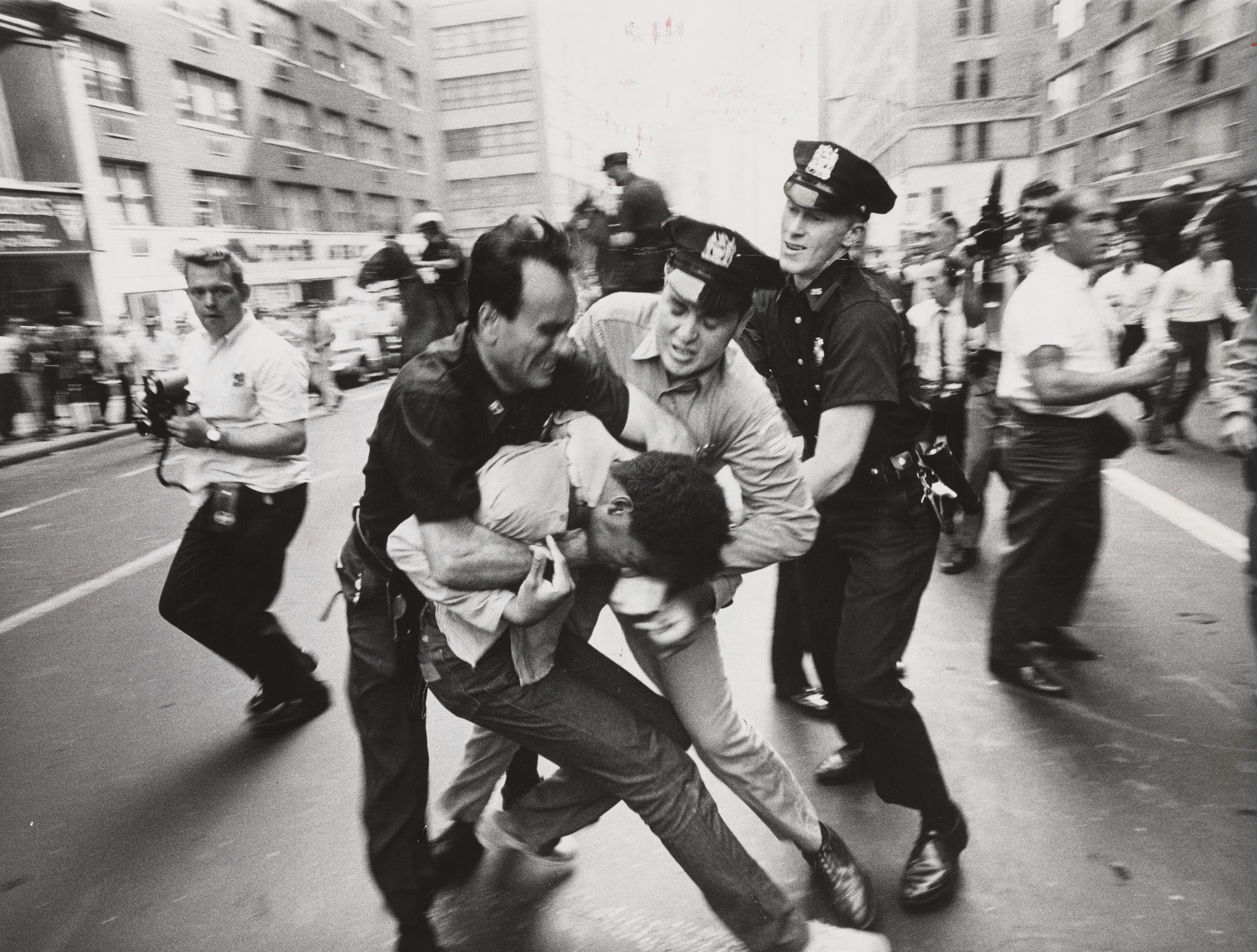 Don Hogan Charles/The New York Times. Policemen Scuffling with Demonstrator  Outside Armory. August 3, 1968 | MoMA