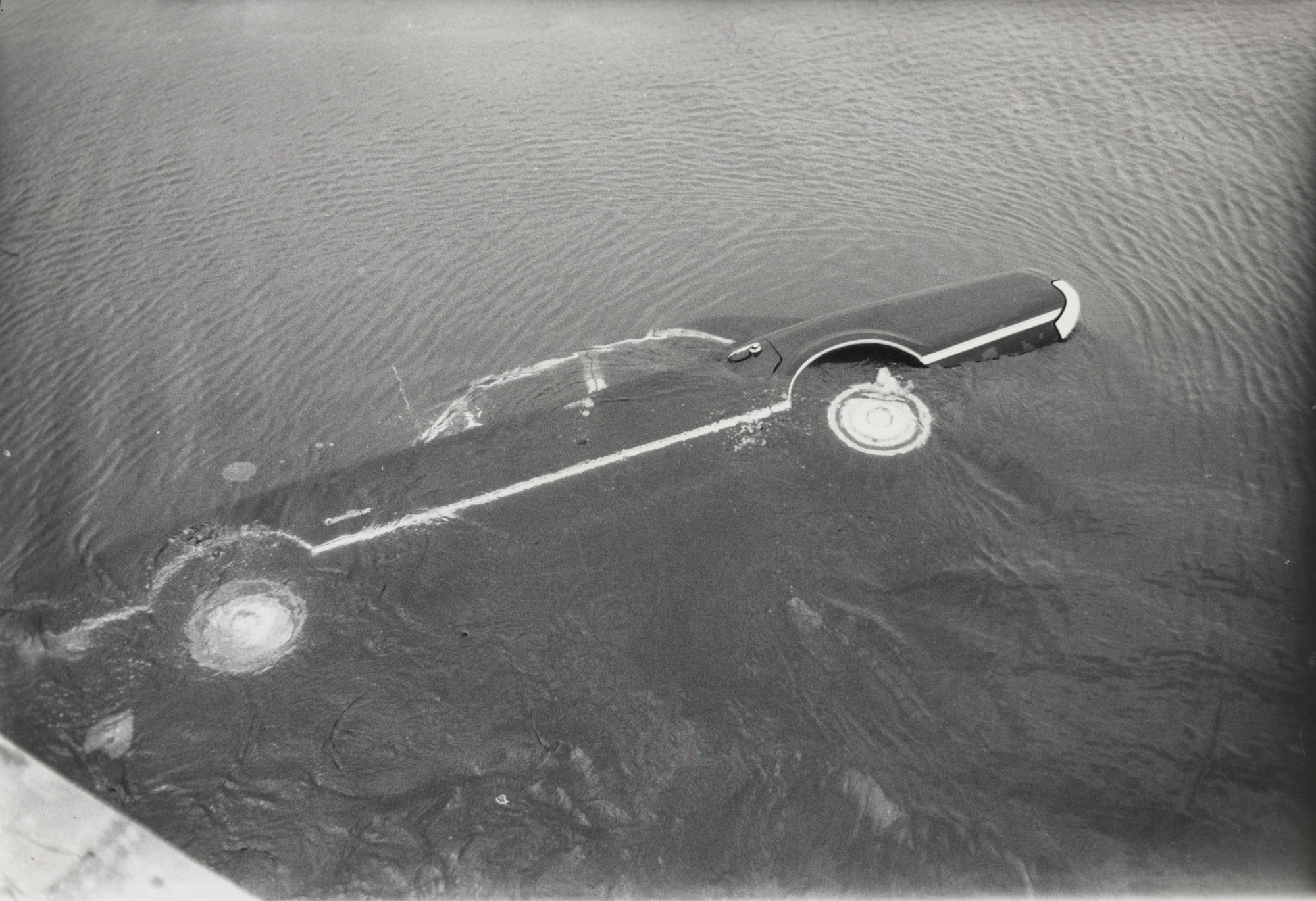 John Hubbard/Black Star Publishing Company. &#34;Kennedy Car off Bridge to Chappaquiddick Island, Massachusetts&#34;. July 19, 1969