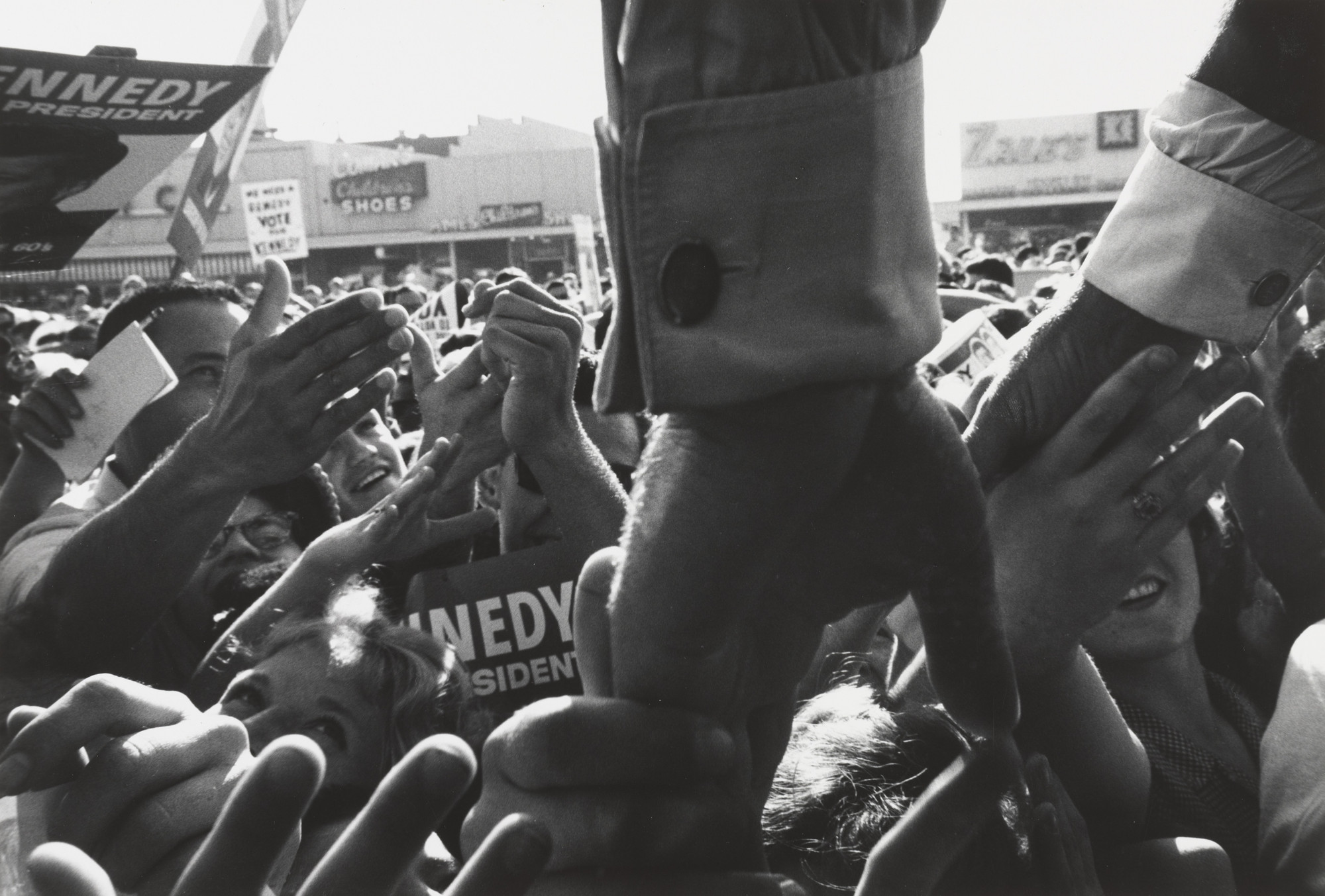 Cornell Capa. John F. Kennedy Shaking Hands. 1960
