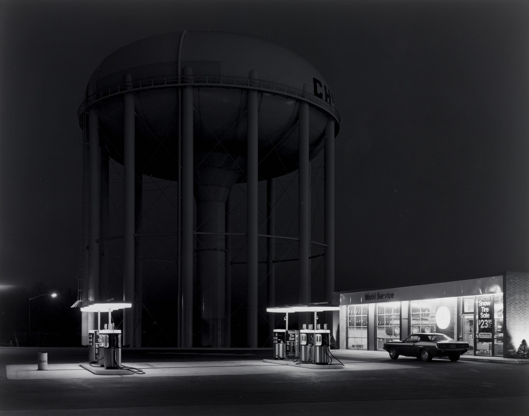 George A. Tice. Petit&#39;s Mobil Station and Watertower, Cherry Hill, New Jersey. 1974