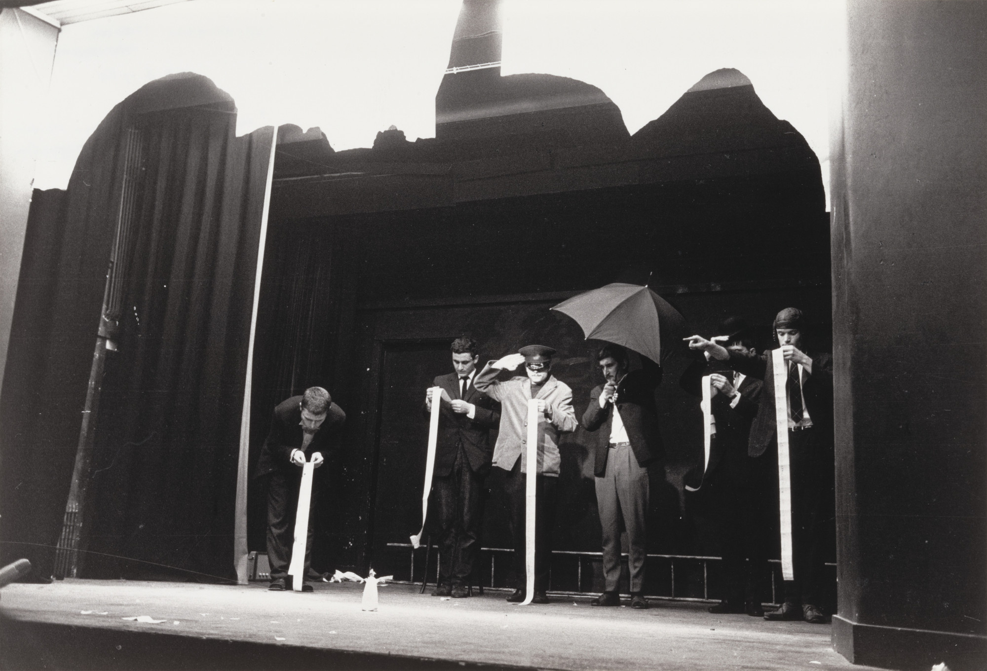 George Maciunas. In Memoriam to Adriano Olivetti Version 3 Ballet , performed during Fluxus Festival/Theatre Compositions/Street Compositions/Exhibits/Electronic Music , Hypokriterion Theater, Amsterdam, June 23, 1963