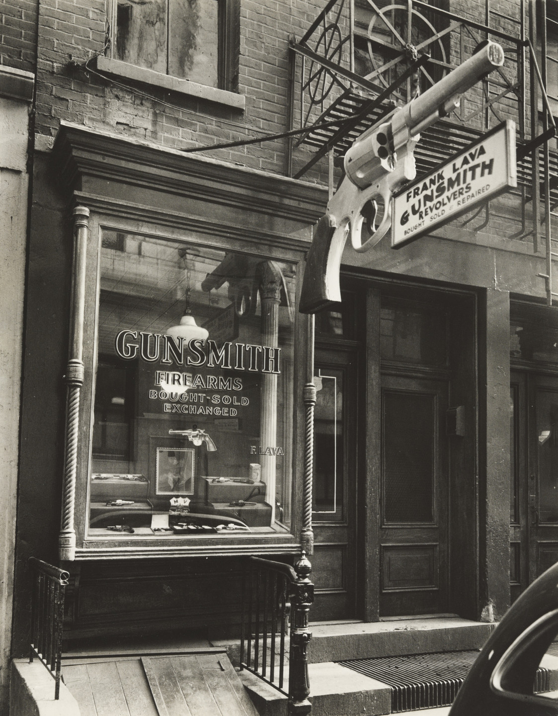 Berenice Abbott. Gunsmith, 6 Centre Market Place, Manhattan. February 4, 1937