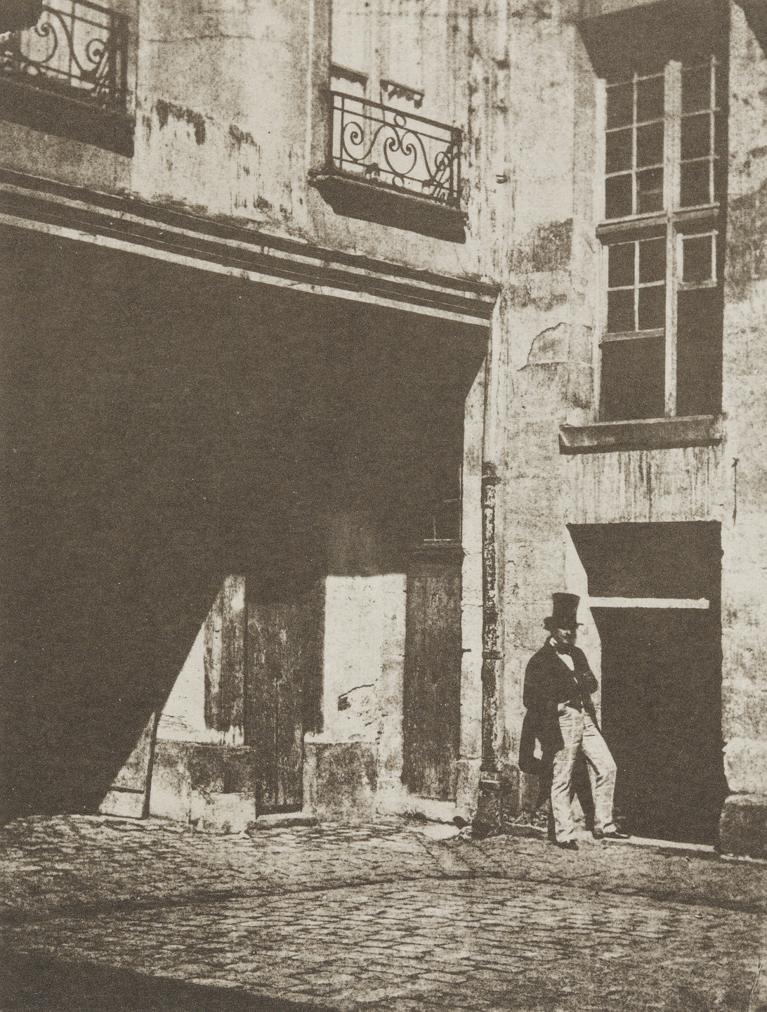 Charles Nègre. The Courtyard of 21 Quai Bourbon, Paris. 1851
